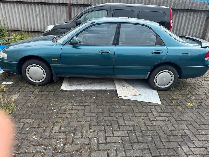 Second-hand Mazda 626 116 CP (85 kW) 1995 Albastru Berlinǎ