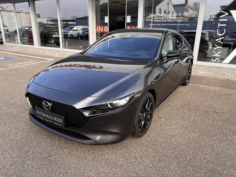 Grau Gebraucht 2024 Mazda 3 Homura-Line Limousine | 28.590 € - Bild 1/3