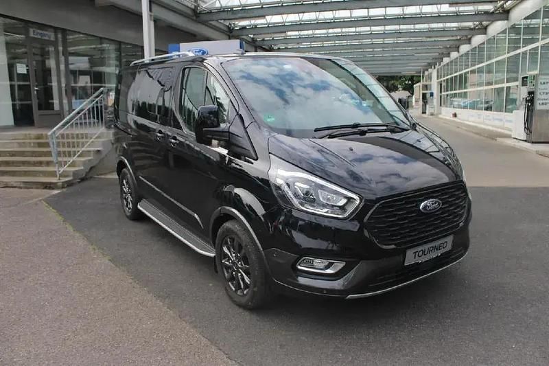 Obsidianschwarz metallic Gebraucht 2021 Ford Tourneo Custom Limousine | 41.990 € - Bild 1/4