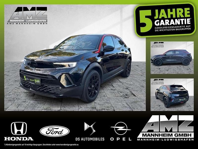 Diamant schwarz/karbon schwarz Gebraucht 2023 Opel Mokka-e GS Line SUV | 18.250 € (Guter Preis) - Bild 1/4