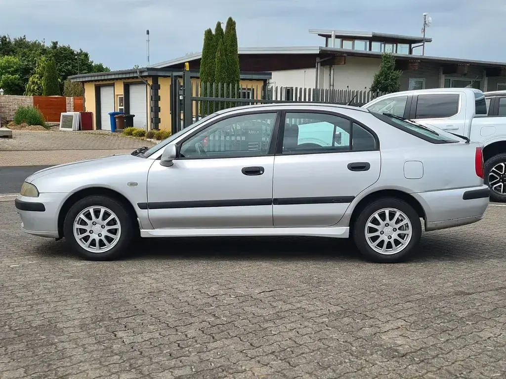 Gebraucht Mitsubishi Carisma 103 PS (75 kW) 2002 Grau Limousine