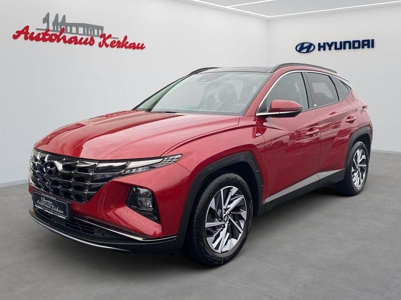 Sunset red (metallic) Gebraucht 2021 Hyundai Tucson Trend SUV | 25.950 € (Fairer Preis) - Bild 1/4