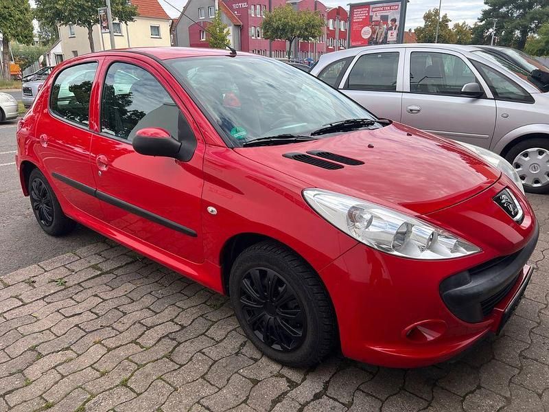 Gebraucht Peugeot 206 Basis 73 PS (53 kW) 2011 Rot Limousine