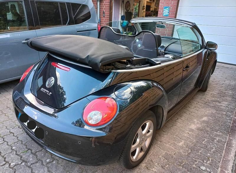 Gebraucht VW New Beetle 102 PS (75 kW) 2010 Schwarz Kleinwagen