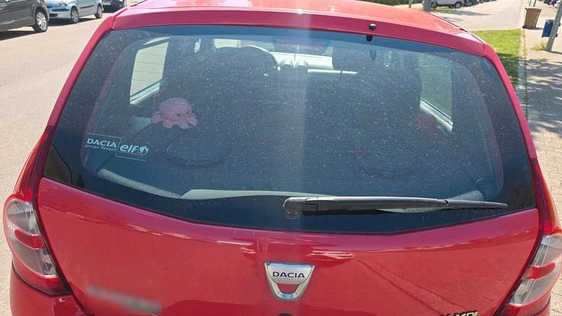 Second-hand Dacia Sandero 75 CP (55 kW) 2009 Roșu Berlinǎ