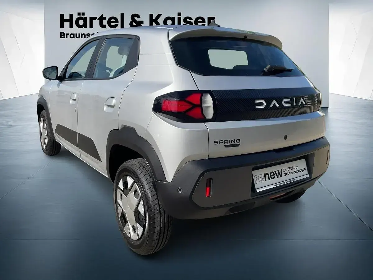 Gebraucht Dacia Spring Expression 33 kW (45 PS) 2025 Lightninggraumetallic (grau) Kleinwagen