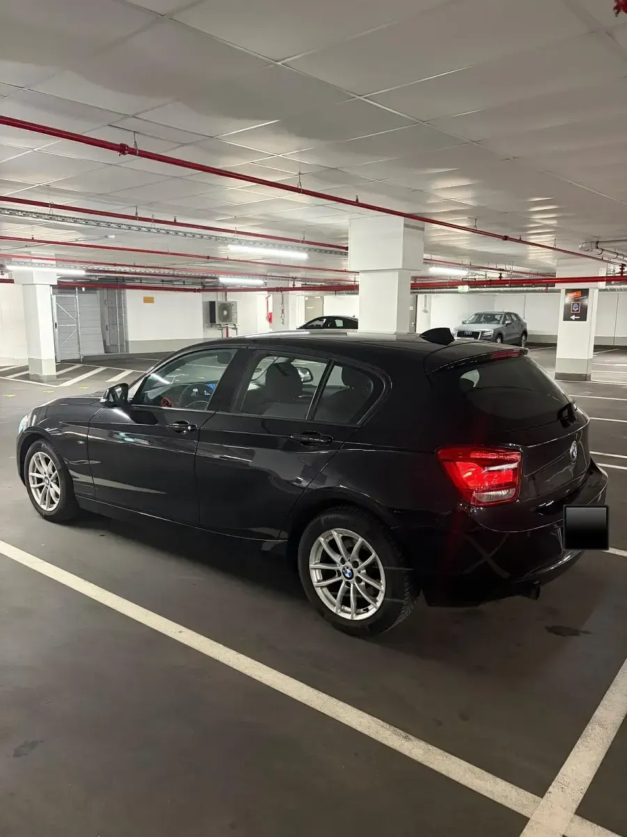 Gebraucht BMW 118 Sport Line 170 PS (125 kW) 2011 Schwarz Kleinwagen