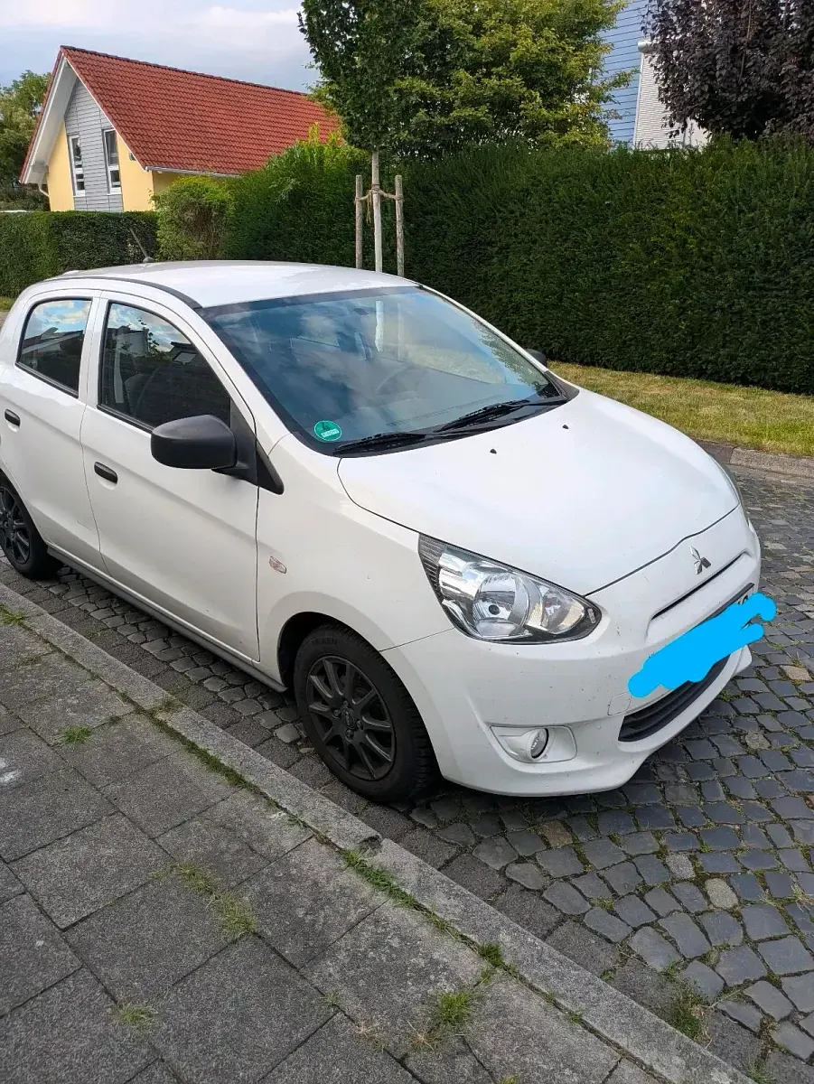 Gebraucht Mitsubishi Space Star 71 PS (52 kW) 2015 Weiß Kleinwagen