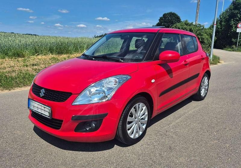 Rot Gebraucht 2011 Suzuki Swift Kleinwagen | 5.490 € (Fairer Preis) - Bild 1/4