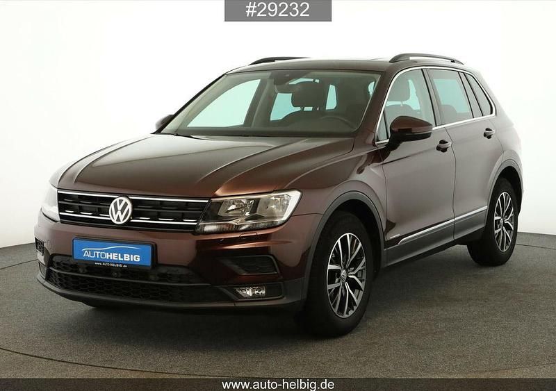 Crimson red metallic Gebraucht 2019 VW Tiguan Comfortline SUV | 21.990 € (Fairer Preis) - Bild 1/4