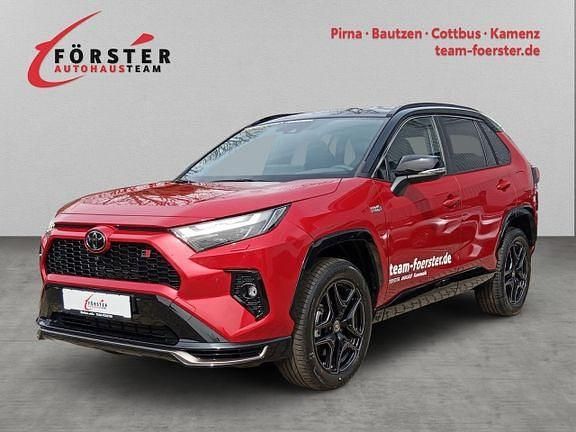 Karminarot metallic / dach schwarz Gebraucht 2023 Toyota RAV4 Hybrid Sport SUV | 54.890 € - Bild 1/4