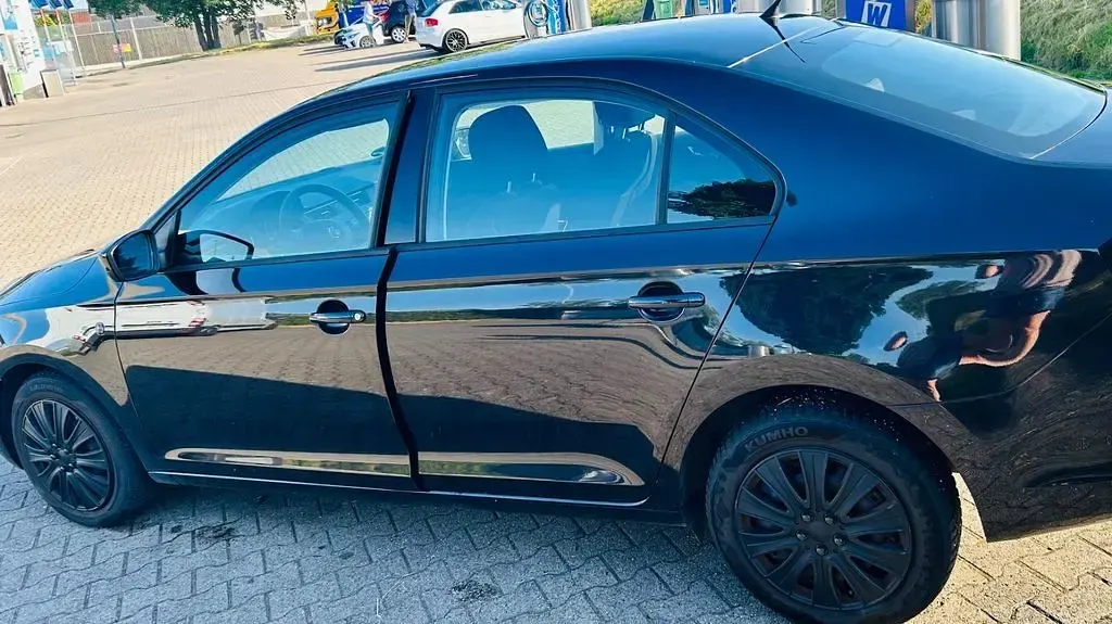Gebraucht Skoda Rapid Ambition 86 PS (63 kW) 2013 Schwarz Kleinwagen