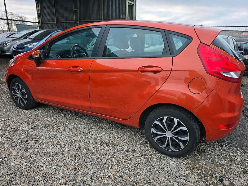 Gebraucht Ford Fiesta 60 PS (44 kW) 2011 Orange Kleinwagen