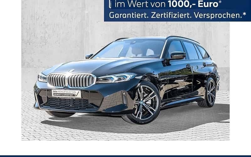 Schwarz Gebraucht 2024 BMW 330e M Sport Kombi | 39.870 € (Superpreis) - Bild 1/4