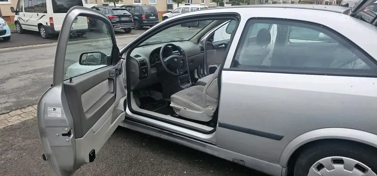 Second-hand Opel Astra 86 CP (63 kW) 2001 Argintiu Coupe
