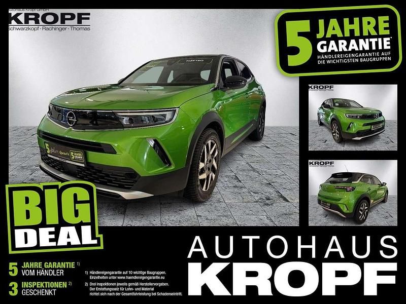 Lackierung matcha green/typ au Gebraucht 2023 Opel Mokka-e Elegance SUV | 21.190 € (Fairer Preis) - Bild 1/4