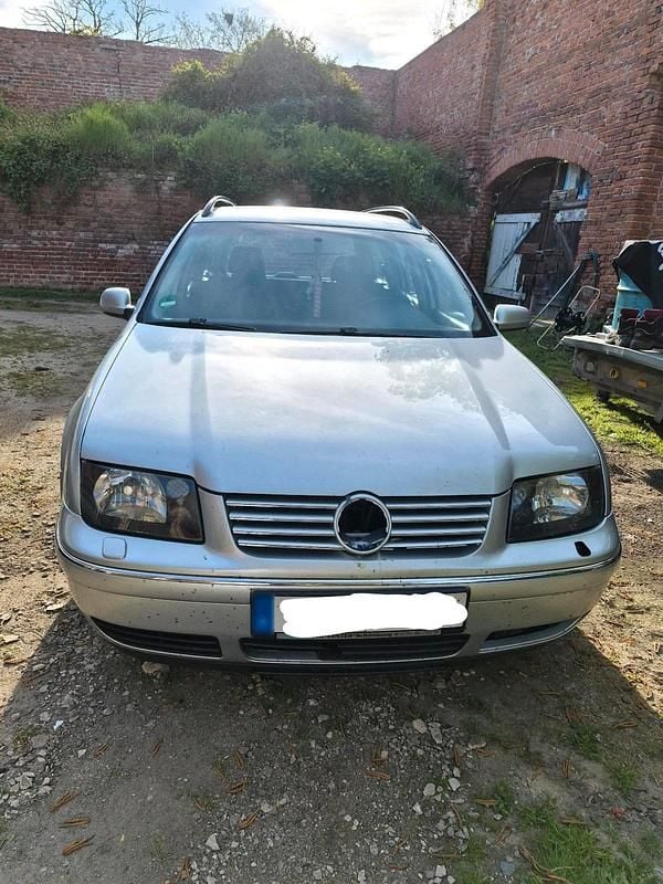 Second-hand VW Bora 101 CP (74 kW) 2004 Argintiu Break