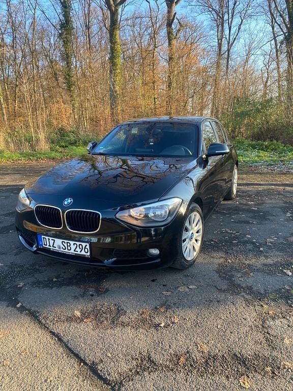 Gebraucht BMW 116 116 PS (85 kW) 2013 Schwarz Kleinwagen
