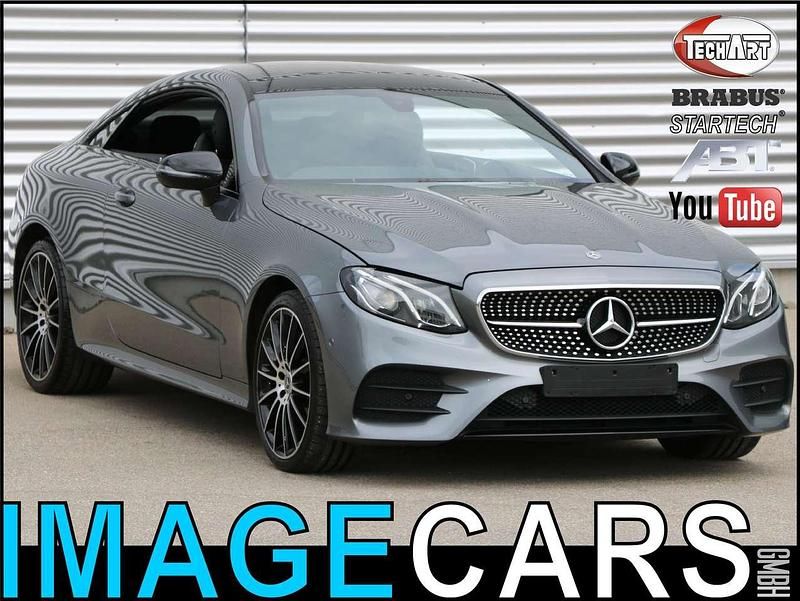 992 selenitgrau Gebraucht 2019 Mercedes E220 AMG Coupé | 39.900 € (Fairer Preis) - Bild 1/4