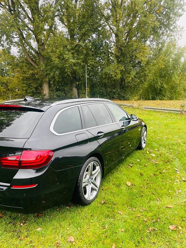 Gebraucht BMW 520 184 PS (135 kW) 2014 Schwarz Kombi