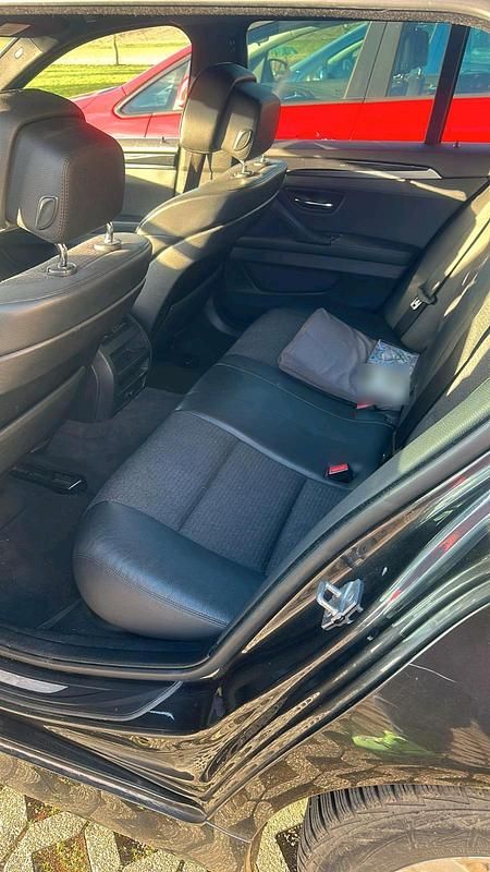 Gebraucht BMW 520 184 PS (135 kW) 2011 Schwarz Kombi