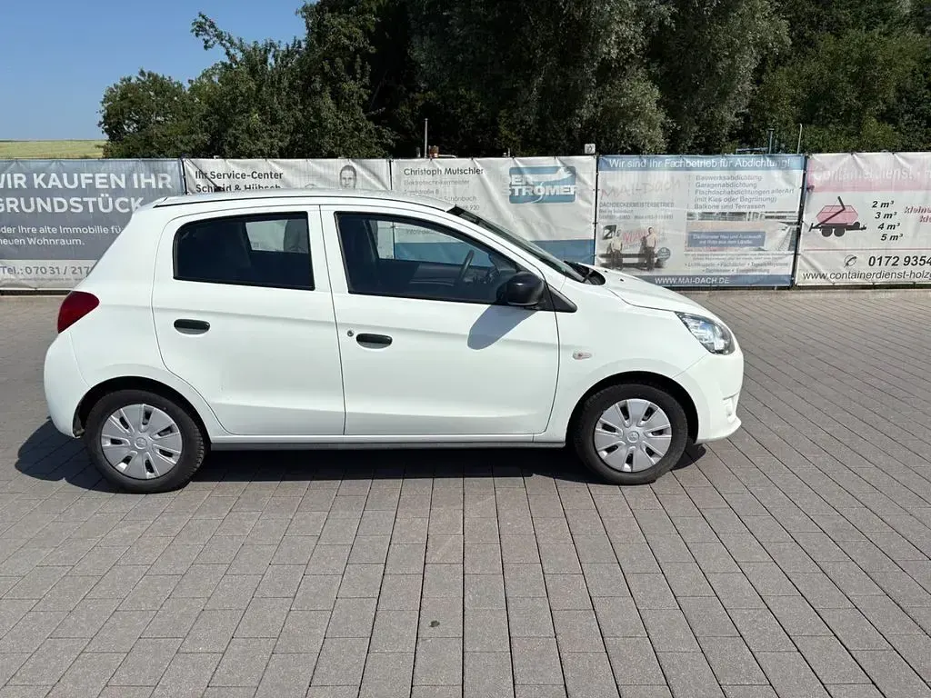 Gebraucht Mitsubishi Space Star Basis 71 PS (52 kW) 2015 Weiß Limousine