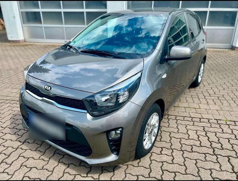 Grau Gebraucht 2019 Kia Picanto DREAM-TEAM Edition Kleinwagen | 10.500 € (Fairer Preis) - Bild 1/4