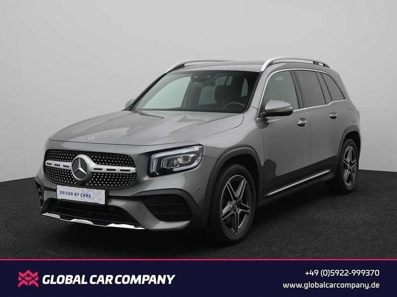 Mountaingrau met. Gebraucht 2021 Mercedes GLB180 AMG line SUV | 28.850 € (Fairer Preis) - Bild 1/4