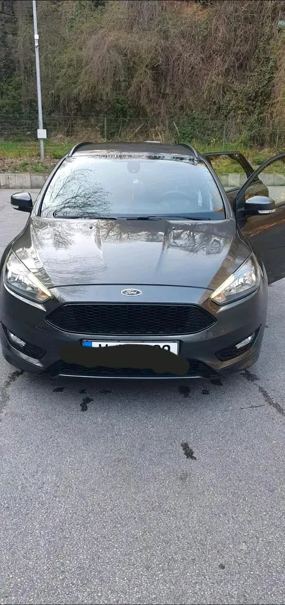 Używany Ford Focus Titanium 125 KM (91 kW) 2018 Brązowy Kombi