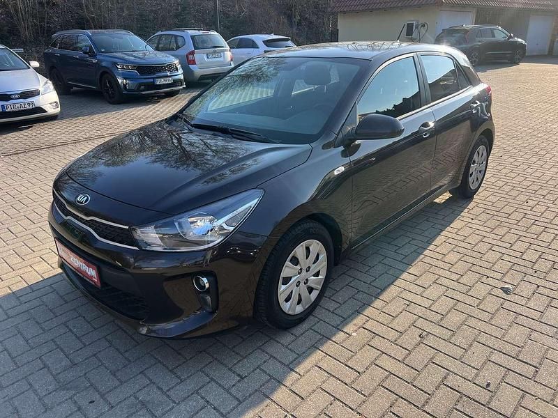Gebraucht Kia Rio 84 PS (61 kW) 2017 (sen) sienna brown m Kleinwagen