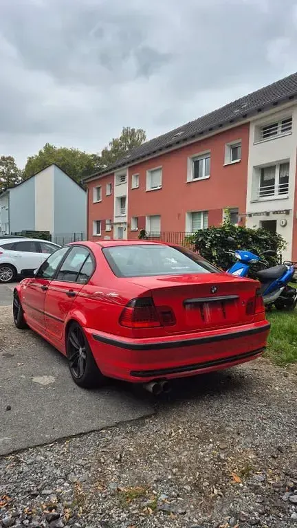 Gebraucht BMW 316 Performance 105 PS (77 kW) 1999 Rot Limousine