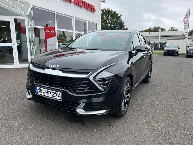 (1k) zilinaschwarz met. Gebraucht 2023 Kia Sportage 2 SUV | 35.479 € (Fairer Preis) - Bild 1/4