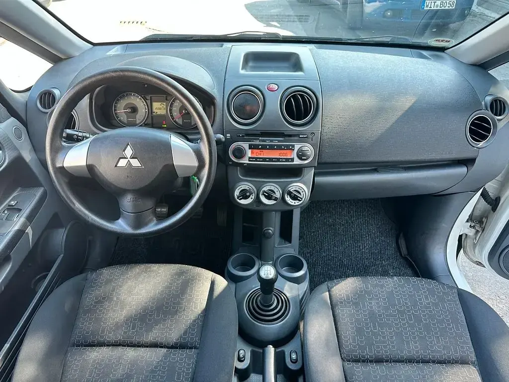 Gebraucht Mitsubishi Colt 75 PS (55 kW) 2012 Weiß Kleinwagen
