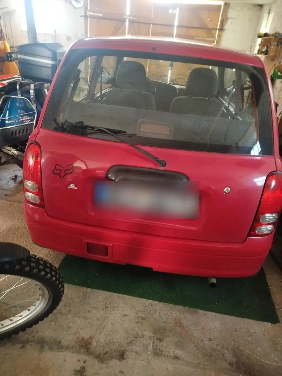 Gebraucht Daihatsu Cuore 50 PS (36 kW) 2002 Rot Kleinwagen