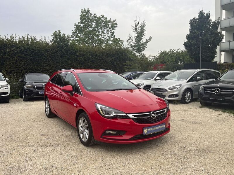 Lava rot Gebraucht 2020 Opel Astra Elegance Kombi | 11.400 € (Guter Preis) - Bild 1/4