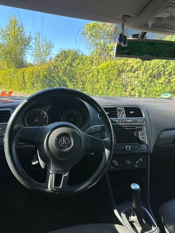Second-hand VW Polo Highline 105 CP (77 kW) 2010 Portocaliu Hatchback