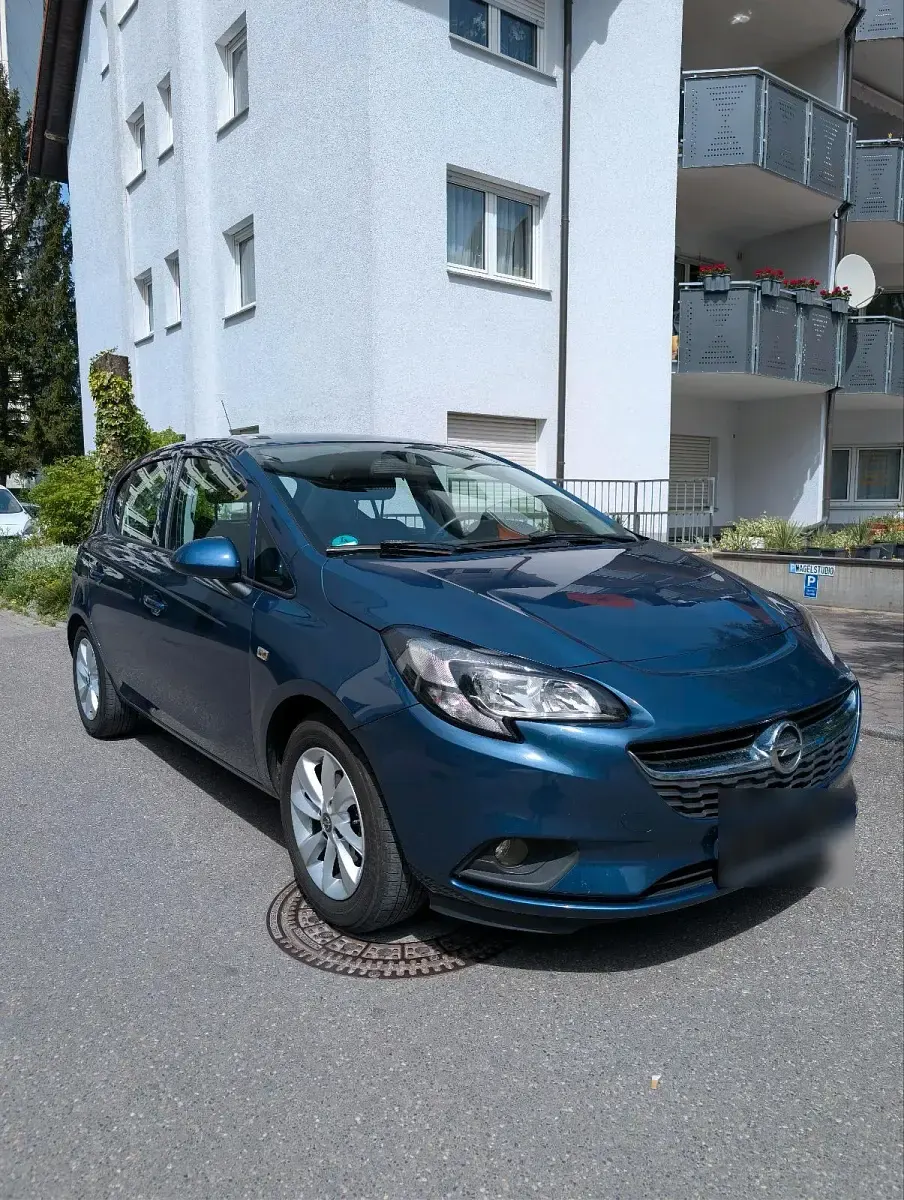 Gebraucht Opel Corsa drive 90 PS (66 kW) 2016 Blau Kleinwagen