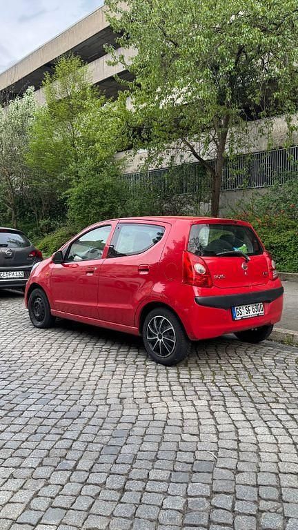 Gebraucht Nissan Pixo Acenta 68 PS (50 kW) 2011 Rot Kleinwagen