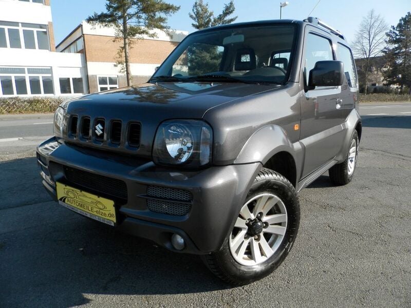 Grau Gebraucht 2012 Suzuki Jimny Comfort SUV | 9.900 € (Superpreis) - Bild 1/4