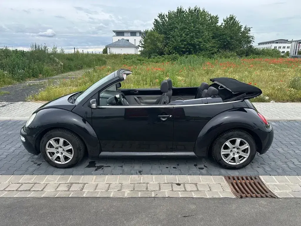 Gebraucht VW New Beetle 102 PS (75 kW) 2004 Schwarz Kleinwagen