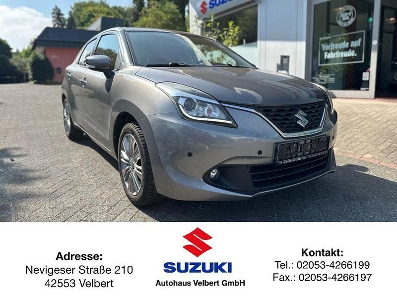 Grau Gebraucht 2018 Suzuki Baleno Comfort Limousine | 10.490 € (Fairer Preis) - Bild 1/4