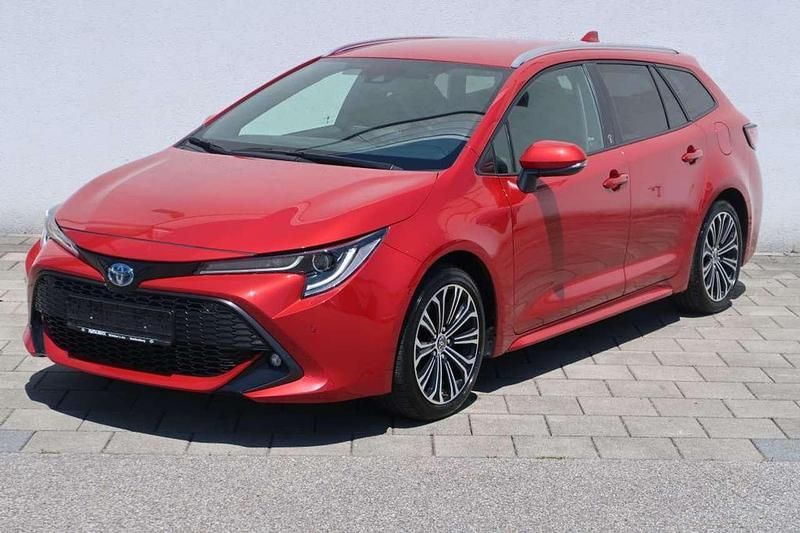 Karminarot metallic Gebraucht 2022 Toyota Corolla Team Kombi | 23.770 € (Guter Preis) - Bild 1/4