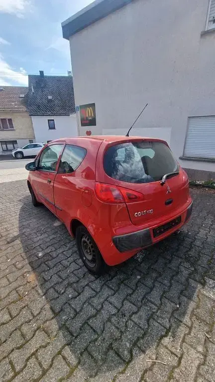 Gebraucht Mitsubishi Colt Invite 95 PS (69 kW) 2004 Rot Kleinwagen