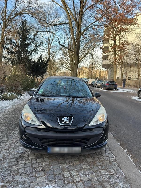 Gebraucht Peugeot 206+ 74 PS (54 kW) 2011 Schwarz Kleinwagen