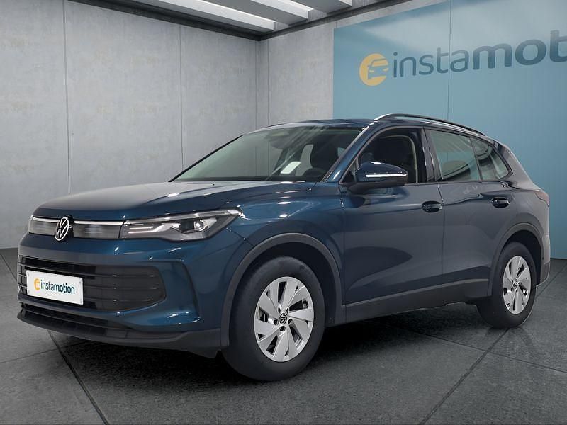 Blau Gebraucht 2024 VW Tiguan SUV | 35.199 € (Fairer Preis) - Bild 1/4