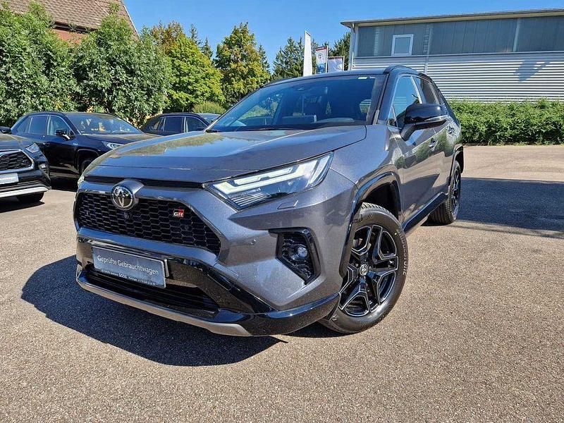 Marlingrau/schwarz (metallic) Gebraucht 2023 Toyota RAV4 Hybrid Sport SUV | 48.990 € - Bild 1/4