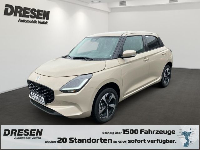 Beige Neu 2025 Suzuki Swift Comfort+ Kleinwagen | 21.140 € - Bild 1/4