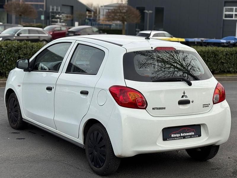 Gebraucht Mitsubishi Space Star Basis 71 PS (52 kW) 2014 Weiß Van / Kleinbus