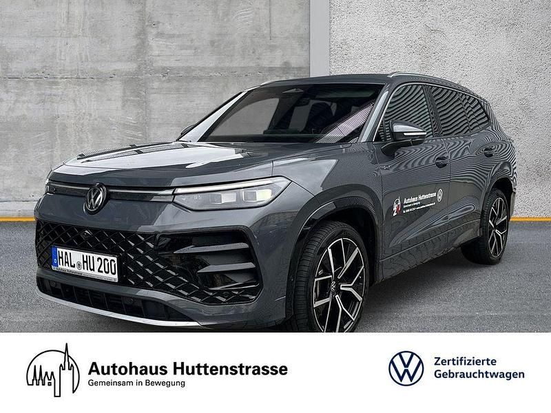 Delfingrau metallic Gebraucht 2025 VW Tayron R-line SUV | 51.820 € (Superpreis) - Bild 1/4