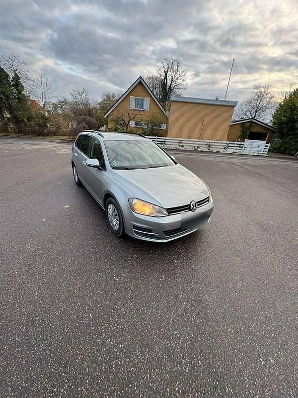Second-hand VW Golf VII 105 CP (77 kW) 2014 Argintiu Break